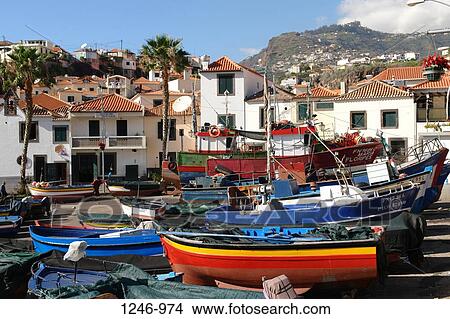 Fishing boats on the beach in front of a small town, Camara de Lobos, Madeira, Portugal View Large Photo Image Picture - Fishing boats on the beach in front of a small town, Camara de Lobos, Madeira, Portugal. Fotosearch