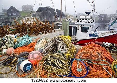 Fishing bobbers and ropes on a pier, Peggy's Cove, Nova Scotia, Canada View Large Photo Image Stock Image - Fishing bobbers and ropes on a pier, Peggy's Cove, Nova Scotia, Canada. Fotosearch