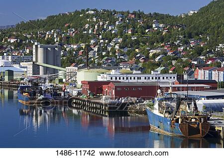 Stock Image - Fishing trawler at a commercial dock, Tromso, Toms County, Nord-Norge, Norway. Fotosearch
