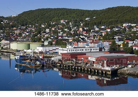 Stock Photo - Fishing trawler at a commercial dock, Tromso, Toms County, Nord-Norge, Norway. Fotosearch