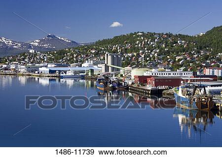 Stock Photo - Fishing trawler at a commercial dock, Tromso, Toms County, Nord-Norge, Norway. Fotosearch