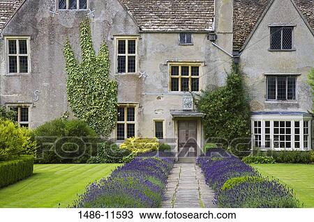 Formal garden in front of a mansion, Avebury Manor, Avebury Manor and Garden, Avebury, Wiltshire, England View Large Photo Image Stock Image - Formal garden in front of a mansion, Avebury Manor, Avebury Manor and Garden, Avebury, Wiltshire, England. Fotosearch