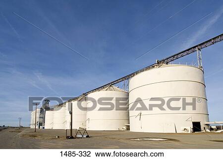 Grain elevators in a field, Sacramento Valley, Central Valley, California, USA View Large Photo Image Stock Image - Grain elevators in a field, Sacramento Valley, Central Valley, California, USA. Fotosearch