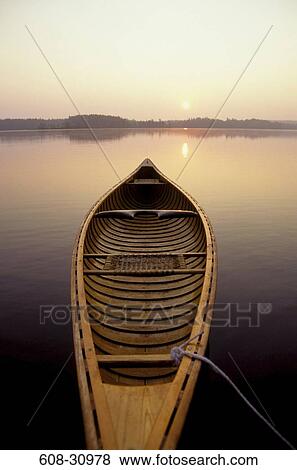 High angle view of a boat in a lake View Large Photo Image Stock Photo - High angle view of a boat in a lake. Fotosearch