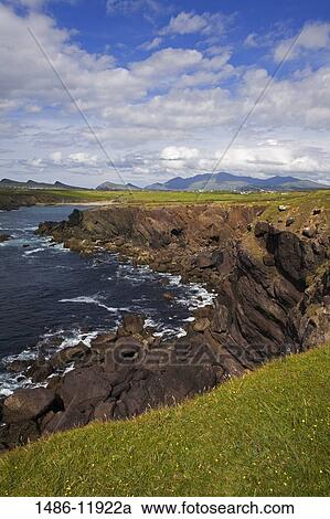 Stock Image - High angle view of a coastline, Atlantic Ocean, Clogher Head, Dingle, Dingle Peninsula, County Kerry, Munster Province, Ireland. Fotosearch