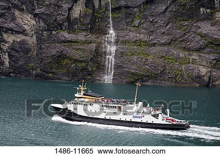 High angle view of a ferry in a fjord, Geirangerfjord, More og Romsdal, Sunnmore, Norway View Large Photo Image Stock Photography - High angle view of a ferry in a fjord, Geirangerfjord, More og Romsdal, Sunnmore, Norway. Fotosearch