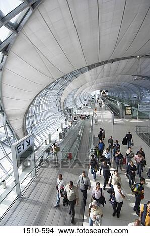 High angle view of a group of people at an airport, Suvarnabhumi Airport, Bangkok, Thailand View Large Photo Image Picture - High angle view of a group of people at an airport, Suvarnabhumi Airport, Bangkok, Thailand. Fotosearch
