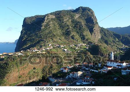 Stock Image - High angle view of a town in a valley, Penha de Aguia, Faial, Madeira, Portugal. Fotosearch