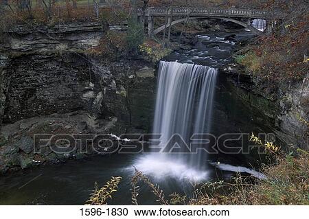 Stock Image - High angle view of a waterfall, Minneopa Falls, Minneopa State Park, Mankato, Minnesota, USA. Fotosearch
