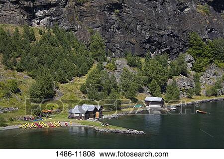 High angle view of canoe rental centers at a fjord, Flamsdalen Valley, Flam, Aurlandsfjord, Sogn Og Fjordane, Norway View Large Photo Image Stock Photo - High angle view of canoe rental centers at a fjord, Flamsdalen Valley, Flam, Aurlandsfjord, Sogn Og Fjordane, Norway. Fotosearch
