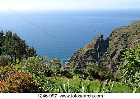 Stock Photo - High angle view of cliffs at the coast, Prazeres, Madeira, Portugal. Fotosearch