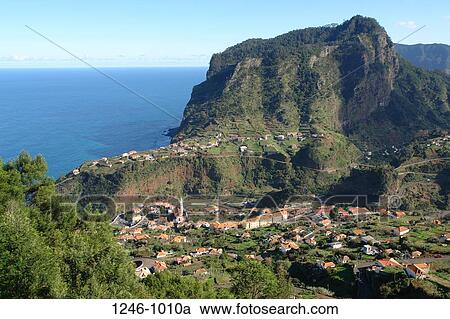 Stock Image - High angle view of houses in a valley, Penha de Aguia, Faial, Madeira, Portugal. Fotosearch