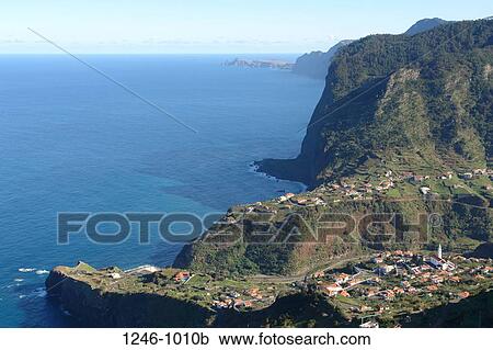 Stock Image - High angle view of houses in a valley, Penha de Aguia, Faial, Madeira, Portugal. Fotosearch