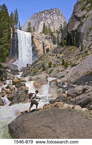 Hiker walking on a rock, Vernal Falls, Yosemite National Park, California, USA View Large Photo Image Stock Photo - Hiker walking on a rock, Vernal Falls, Yosemite National Park, California, USA. Fotosearch