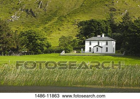 Hotel at the lakeside, Lake Kylemore, Connemara, County Galway, Connacht Province, Republic of Ireland View Large Photo Image Stock Image - Hotel at the lakeside, Lake Kylemore, Connemara, County Galway, Connacht Province, Republic of Ireland. Fotosearch