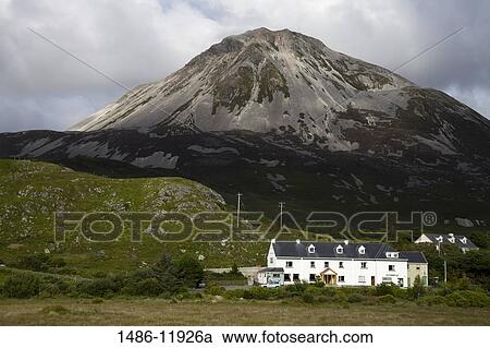 Houses beneath a mountain, Mount Errigal, Dunlewy, County Donegal, Ulster Province, Ireland View Large Photo Image Stock Image - Houses beneath a mountain, Mount Errigal, Dunlewy, County Donegal, Ulster Province, Ireland. Fotosearch