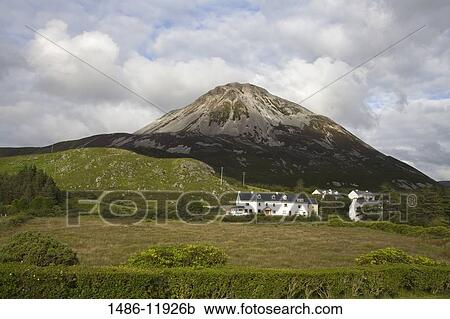 Houses beneath a mountain, Mount Errigal, Dunlewy, County Donegal, Ulster Province, Ireland View Large Photo Image Stock Image - Houses beneath a mountain, Mount Errigal, Dunlewy, County Donegal, Ulster Province, Ireland. Fotosearch