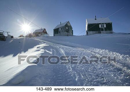 Houses on a snow covered landscape, Ammassalik, Greenland View Large Photo Image Stock Photo - Houses on a snow covered landscape, Ammassalik, Greenland. Fotosearch