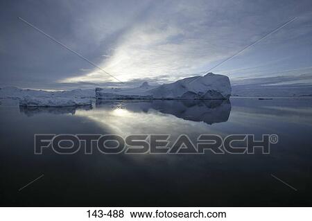 Iceberg in water, Sermilik Fjord, Greenland View Large Photo Image Stock Photo - Iceberg in water, Sermilik Fjord, Greenland. Fotosearch