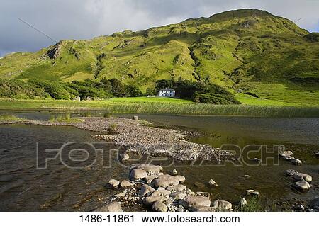 Lake with a hotel and a hill in the background, Lake Kylemore, Connemara, County Galway, Connacht Province, Republic of Ireland View Large Photo Image Stock Image - Lake with a hotel and a hill in the background, Lake Kylemore, Connemara, County Galway, Connacht Province, Republic of Ireland. Fotosearch