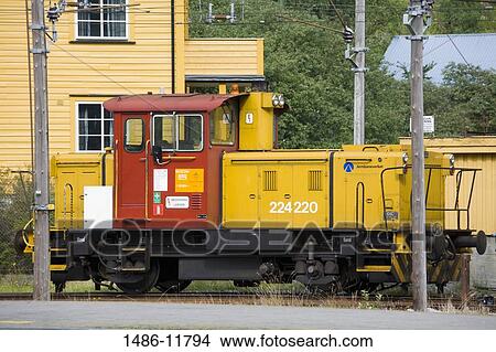 Picture - Locomotive at a railway station, Flam Station, Flam, Aurlandsfjord, Sogn Og Fjordane, Norway. Fotosearch