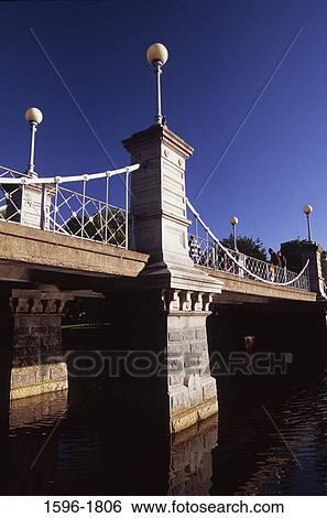 Low angle view of a bridge, Lagoon Bridge, Boston Public Garden, Boston, Suffolk County, Massachusetts, USA View Large Photo Image Stock Photograph - Low angle view of a bridge, Lagoon Bridge, Boston Public Garden, Boston, Suffolk County, Massachusetts, USA. Fotosearch