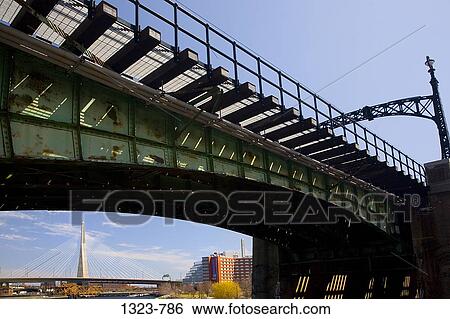 Low angle view of a bridge with another bridge in the background, Leonard P. Zakim Bunker Hill Bridge, Boston, Suffolk County, Massachusetts, USA View Large Photo Image Stock Photograph - Low angle view of a bridge with another bridge in the background, Leonard P. Zakim Bunker Hill Bridge, Boston, Suffolk County, Massachusetts, USA. Fotosearch