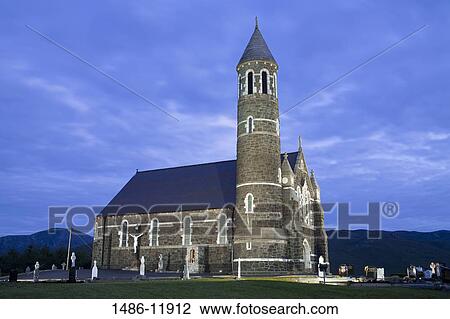 Stock Image - Low angle view of a church, Dunlewy Church, Dunlewy, County Donegal, Ulster Province, Ireland. Fotosearch