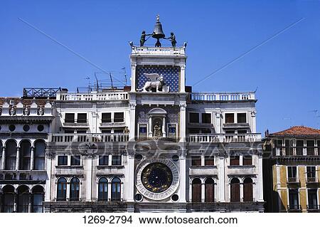 Low angle view of a clock tower, Venice, Veneto, Italy View Large Photo Image Picture - Low angle view of a clock tower, Venice, Veneto, Italy. Fotosearch