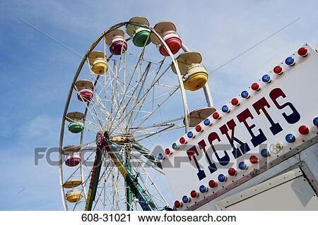 Low angle view of a ferris wheel View Large Photo Image Stock Image - Low angle view of a ferris wheel. Fotosearch