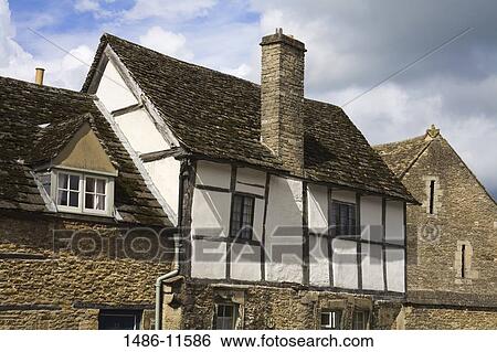 Low angle view of a house, High Street, Lacock, Wiltshire, England View Large Photo Image Stock Photograph - Low angle view of a house, High Street, Lacock, Wiltshire, England. Fotosearch