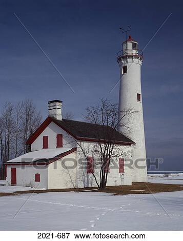 Stock Photo - Low angle view of a lighthouse, Sturgeon Point Lighthouse, Lake Huron, Michigan, USA. Fotosearch