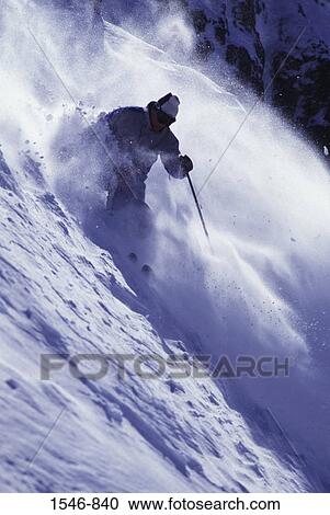 Low angle view of a man skiing on powder snow, woman Valley, Fresno County, California, USA View Large Photo Image Stock Image - Low angle view of a man skiing on powder snow, woman Valley, Fresno County, California, USA. Fotosearch
