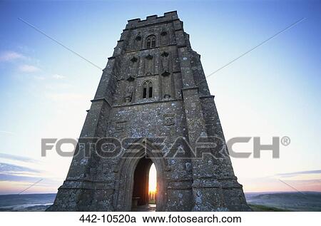 Low angle view of a tower, St. Michael's Tower, Glastonbury Tor, Glastonbury, Somerset, England View Large Photo Image Stock Image - Low angle view of a tower, St. Michael's Tower, Glastonbury Tor, Glastonbury, Somerset, England. Fotosearch