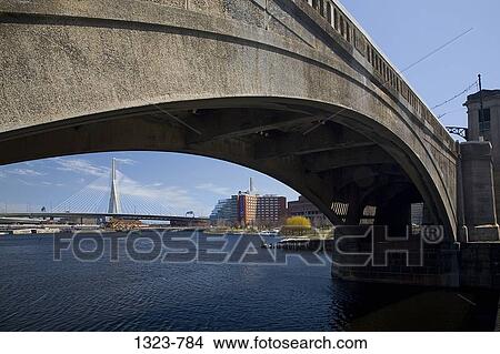 Low angle view of an arch bridge with another bridge in the background, Leonard P. Zakim Bunker Hill Bridge, Boston, Suffolk County, Massachusetts, USA View Large Photo Image Picture - Low angle view of an arch bridge with another bridge in the background, Leonard P. Zakim Bunker Hill Bridge, Boston, Suffolk County, Massachusetts, USA. Fotosearch