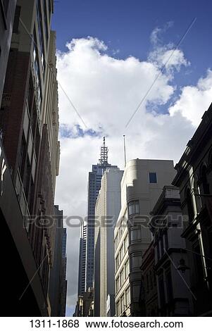 Stock Photo - Low angle view of skyscrapers in a city, Bourke Street, Melbourne, Victoria, Australia. Fotosearch