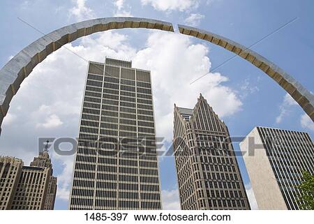 Stock Photo - Low angle view of skyscrapers viewed through an arch sculpture, Renaissance Center, Hart Plaza, Detroit, Wayne County, Michigan, USA. Fotosearch