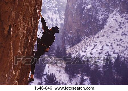 Man climbing a rock, Smith Rock, Oregon, USA View Large Photo Image Stock Photograph - Man climbing a rock, Smith Rock, Oregon, USA. Fotosearch