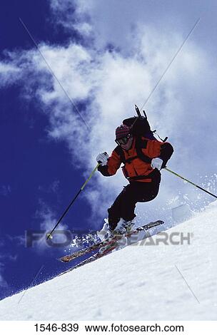 Man skiing on powder snow, Snowbird Ski Resort, Utah, USA View Large Photo Image Stock Photo - Man skiing on powder snow, Snowbird Ski Resort, Utah, USA. Fotosearch