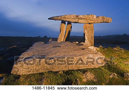 Megalithic stone tomb at sunset, Poulnabrone Dolmen, The Burren, County Clare, Munster Province, Republic of Ireland View Large Photo Image Stock Photography - Megalithic stone tomb at sunset, Poulnabrone Dolmen, The Burren, County Clare, Munster Province, Republic of Ireland. Fotosearch
