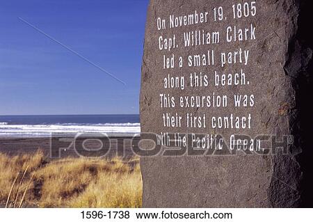 Stock Photo - Memorial plaque with an ocean in the background, Capt. William Clark monument, Discovery Trail, Long Beach, Washington State, USA. Fotosearch
