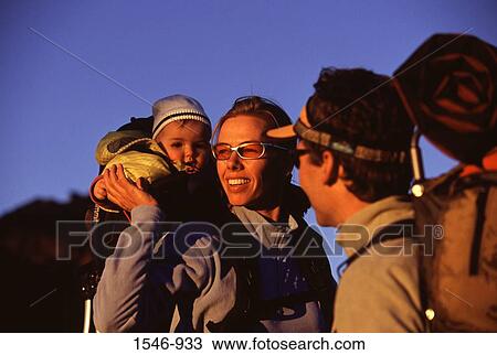 Mid adult couple smiling with their son, Pacific Crest Trail, California, USA View Large Photo Image Stock Image - Mid adult couple smiling with their son, Pacific Crest Trail, California, USA. Fotosearch