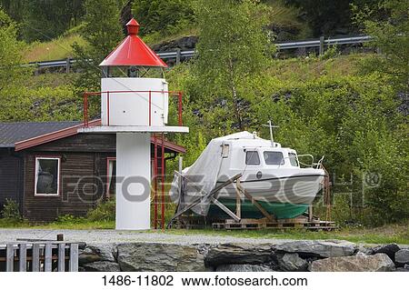Motorboat next to a lighthouse, Flam, Aurlandsfjord, Sogn Og Fjordane, Norway View Large Photo Image Stock Image - Motorboat next to a lighthouse, Flam, Aurlandsfjord, Sogn Og Fjordane, Norway. Fotosearch
