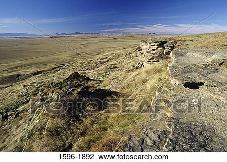 Panoramic view of a landscape, Buffalo Jump, Ulm Pishkun State Park, Montana, USA View Large Photo Image Stock Image - Panoramic view of a landscape, Buffalo Jump, Ulm Pishkun State Park, Montana, USA. Fotosearch