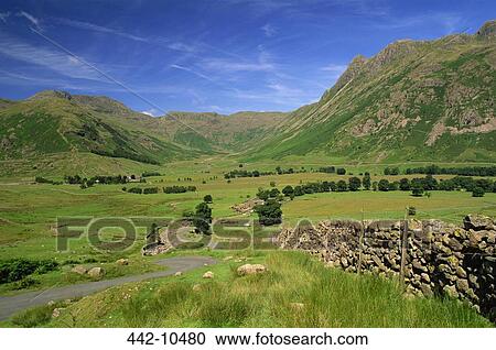 Stock Image - Panoramic view of mountains, Cumbrian Mountains, Great Langdale, English Lake District, Cumbria, England. Fotosearch