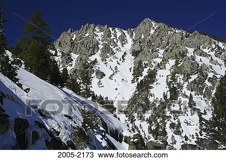 Panoramic view of snow covered mountains, Lake Tahoe, Emerald Bay State Park, Californian Sierra Nevada, California, USA View Large Photo Image Stock Image - Panoramic view of snow covered mountains, Lake Tahoe, Emerald Bay State Park, Californian Sierra Nevada, California, USA. Fotosearch