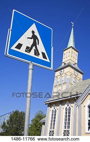 Pedestrian Crossing sign in front of a cathedral, Kirkeparken, Tromso, Toms County, Nord-Norge, Norway View Large Photo Image Stock Photograph - Pedestrian Crossing sign in front of a cathedral, Kirkeparken, Tromso, Toms County, Nord-Norge, Norway. Fotosearch