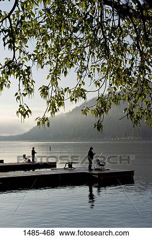 Stock Photo - People fishing in a lake, Donner Lake, Truckee, Nevada County, California, USA. Fotosearch