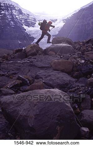 Person hiking on rocks, Mt Edith Cavell, Athabasca River, Jasper National Park, Alberta, Canada View Large Photo Image Stock Image - Person hiking on rocks, Mt Edith Cavell, Athabasca River, Jasper National Park, Alberta, Canada. Fotosearch