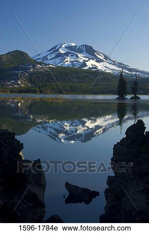 Reflection of a mountain in a lake, Sparks Lake, South Sister, Cascade Lakes Scenic Byway, Deschutes National Forest, Deschutes County, Oregon, USA View Large Photo Image Stock Image - Reflection of a mountain in a lake, Sparks Lake, South Sister, Cascade Lakes Scenic Byway, Deschutes National Forest, Deschutes County, Oregon, USA. Fotosearch
